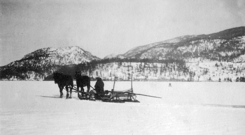 Hauling logs on Long Lake